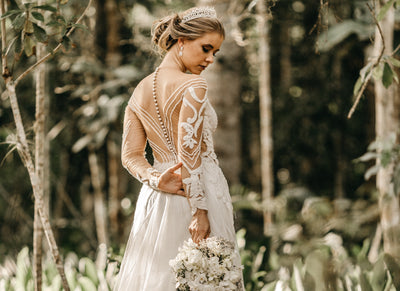 bride behind lace veil